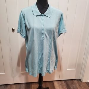 Light blue polo.